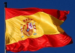 Drapeau de l'Espagne avec Ecusson monté sur un mât en vente chez Promociel